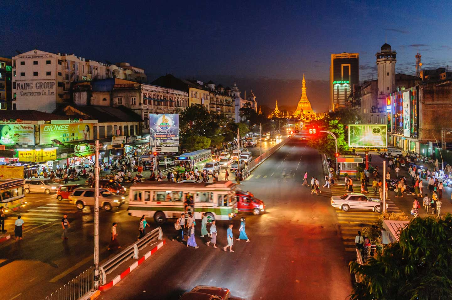 An active downtown scene of Yangon, Myanmar at night