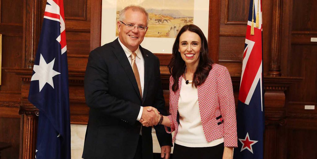 Scott Morrison and Jacinda Ardern shaking hands