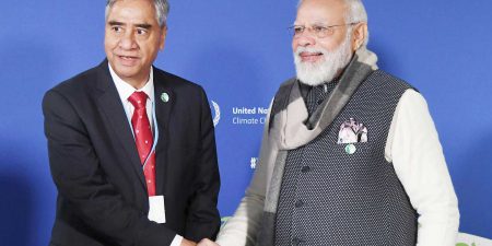 The Prime Minister of India, Shri Narendra Modi shaking hands with the Prime Minister of Nepal, Shri Sher Bahadur Deuba