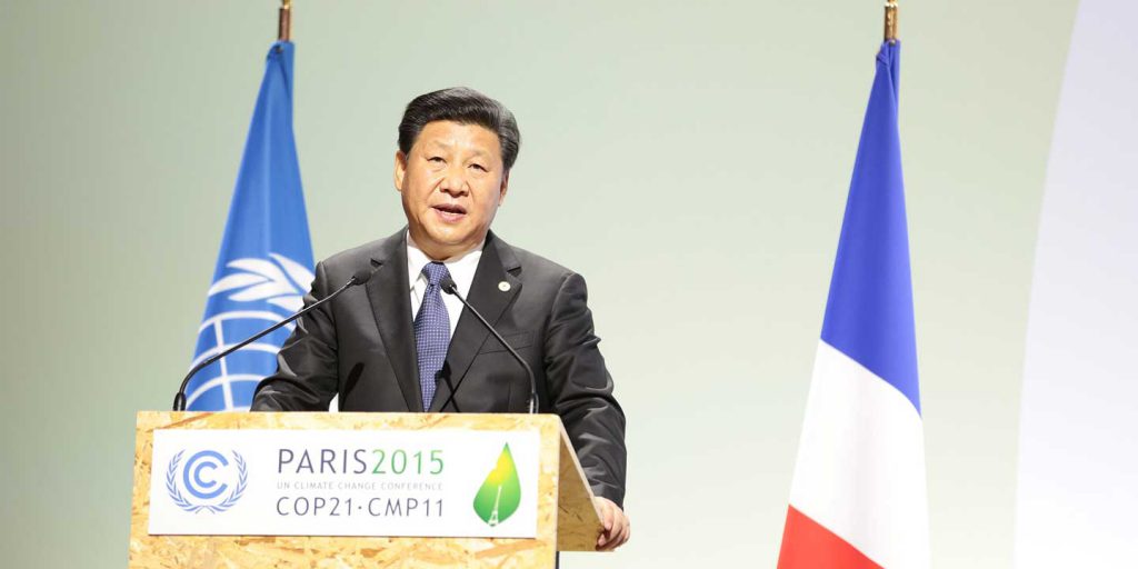 Chinese President Xi Jinping speaking at a podium