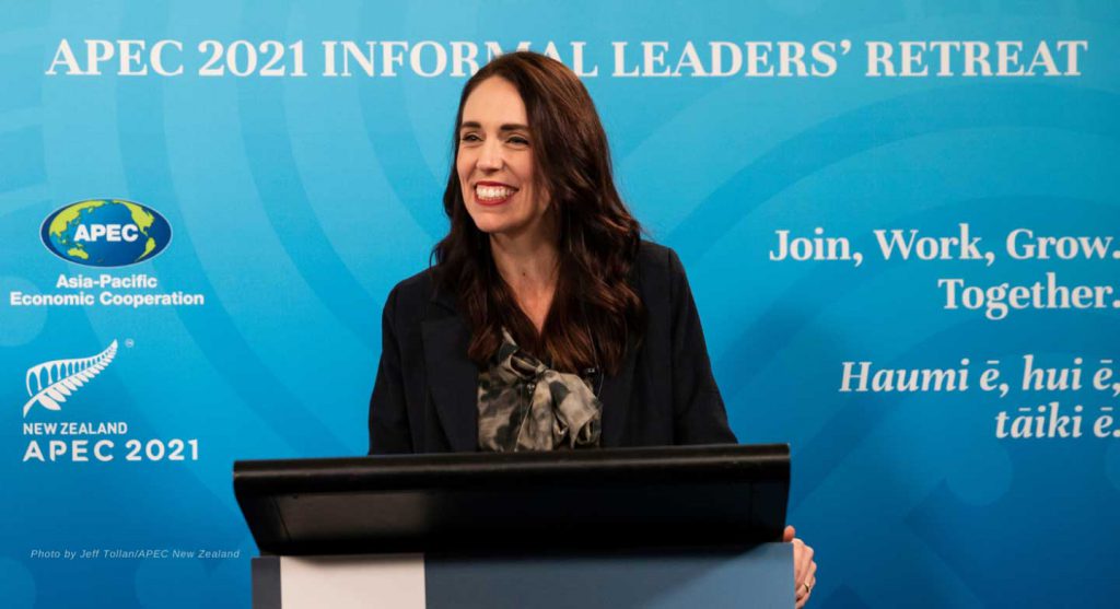 New Zealand Prime Minister Jacinda Ardern speaking at a podium