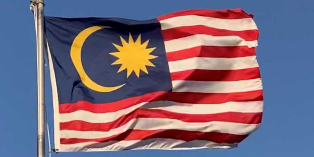 Malaysian flag on a pole