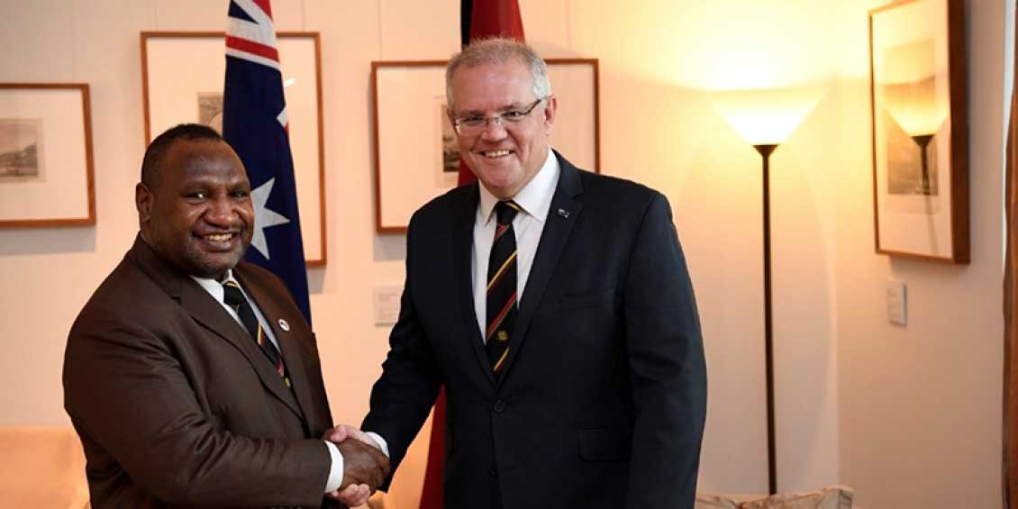 PNG premier James Marape shaking hands with Australian counterpart Scott Morrison