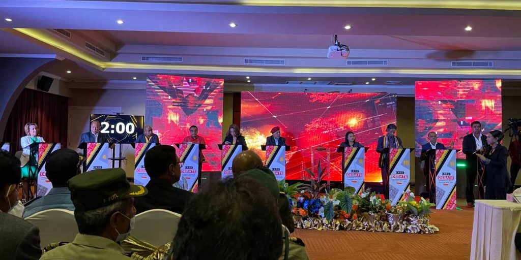 A presidential election debate in Timor-Leste with candidates at podiums